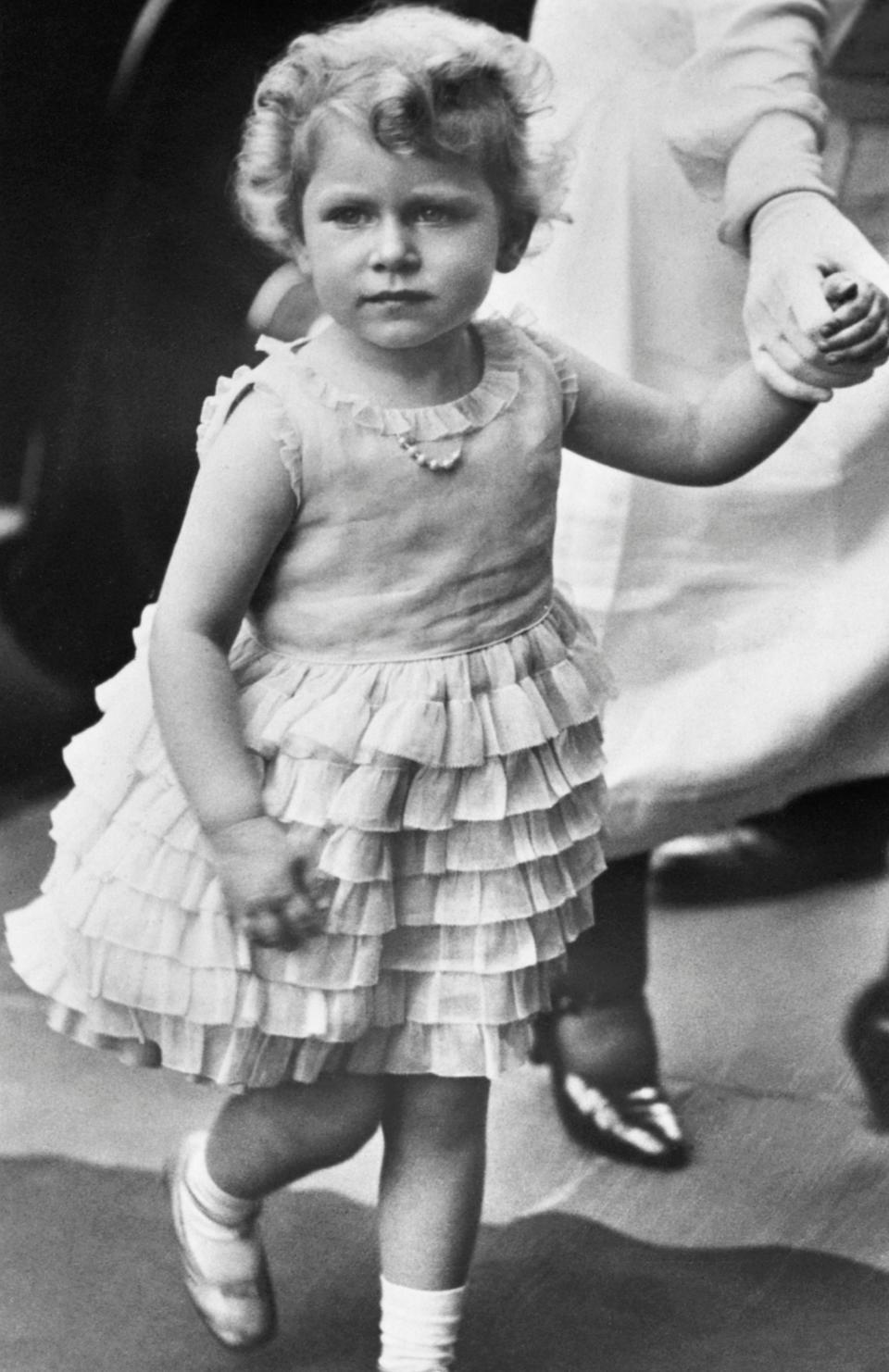 Princess Elizabeth in 1929, aged three, wearing a pearl necklace - Hulton-Deutsch Collection/CORBIS/Corbis via Getty Images