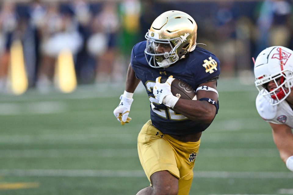 SOUTH BEND, IN – SEPTEMBER 21: Notre Dame Fighting Irish RB Devyn Ford (22) runs with the ball during a college football game between the Notre Dame Fighting Irish and Miami RedHawks on September 21, 2024 at Notre Dame Stadium in South Bend, IN (Photo by James Black/Icon Sportswire via Getty Images)