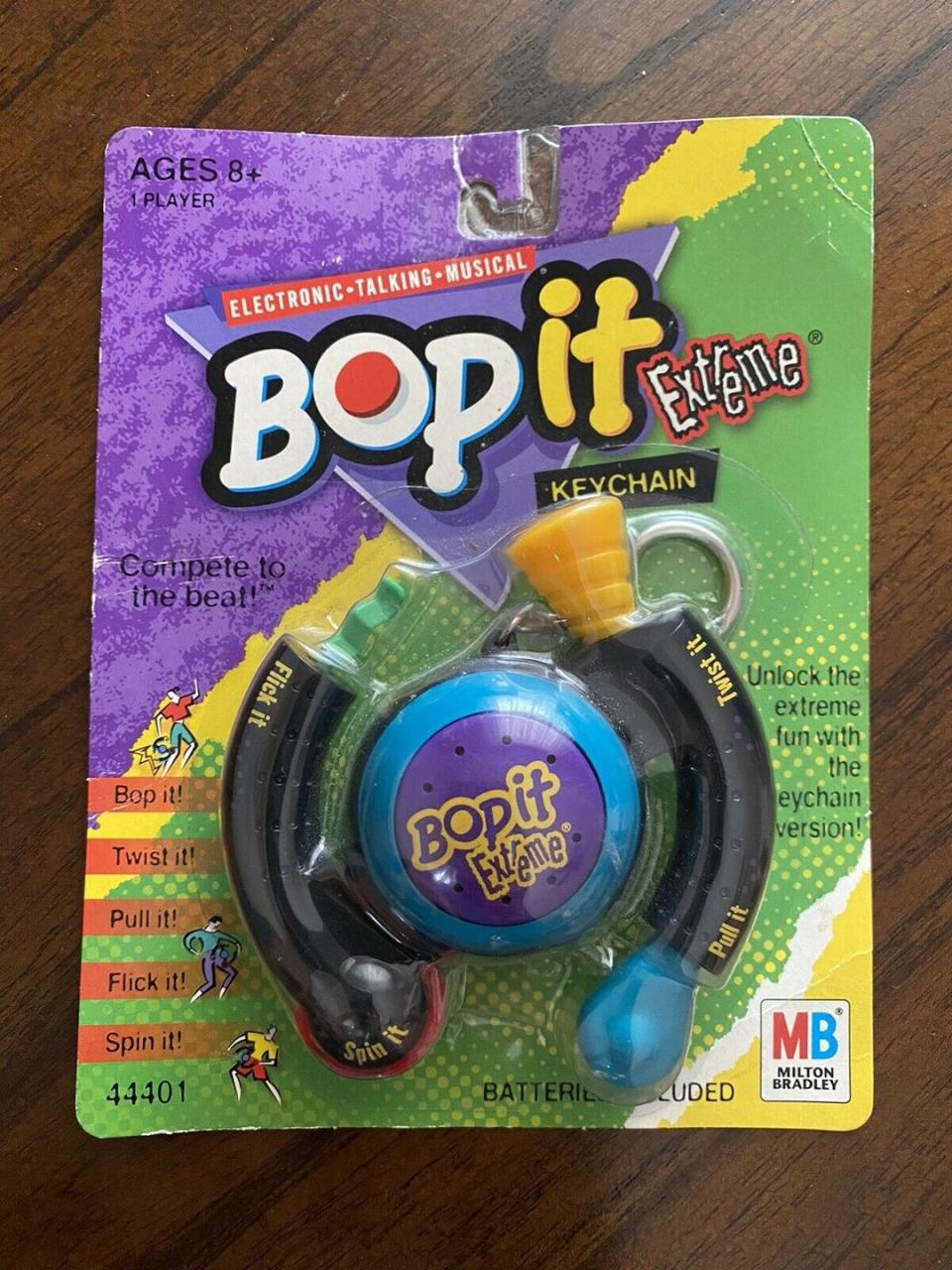 <p>You didn't know stress until you were at the highest speed of Bop It on the playground, and everyone was watching. The <a href="https://www.ebay.com/itm/BRAND-NEW-SEALED-Bop-It-Extreme-Mini-Keychain-2000-Pocket-Hand-held-Vintage/174485116904?hash=item28a01f97e8:g:pNMAAOSwLA9fjJu3" rel="nofollow noopener" target="_blank" data-ylk="slk:mini version of the game;elm:context_link;itc:0;sec:content-canvas" class="link ">mini version of the game</a>, seen here, goes for as high as $200 today. </p>