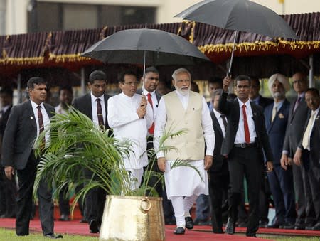 India's Modi visits bombed Sri Lanka church, vows support after attacks