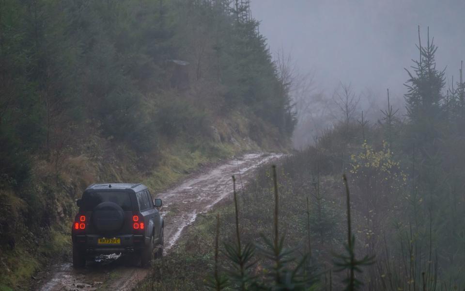 English: 'On Exmoor the moorland hazards came looming out of the fog, but there was nothing to worry in this enormous vehicle'