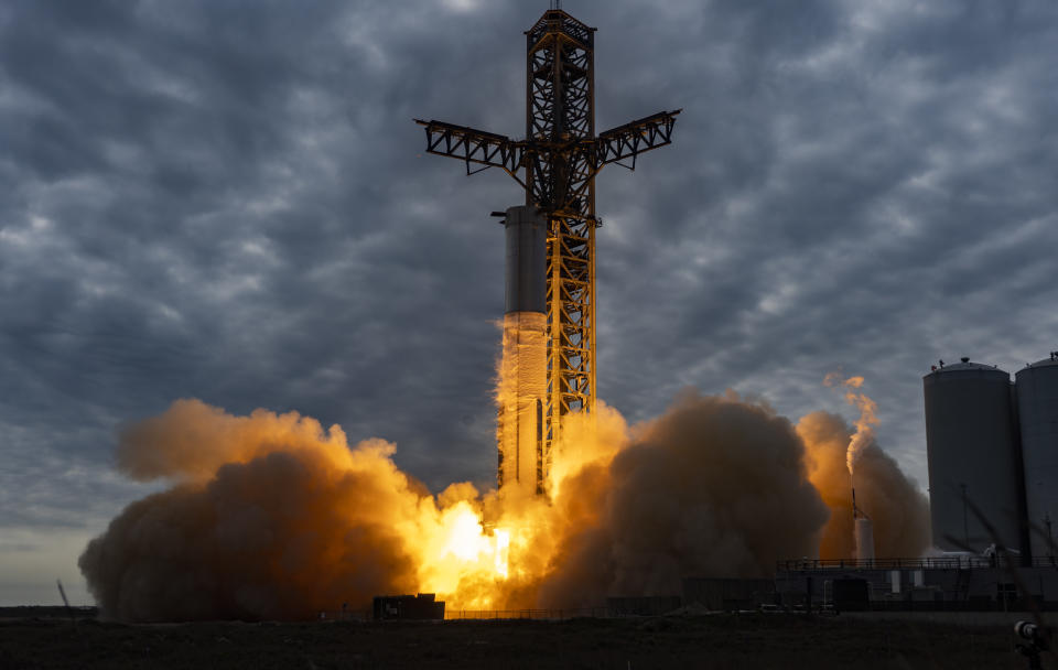 SpaceX's Booster 7 Starship first-stage prototype ignites 31 of its 33 Raptor engines during a static fire test on Feb. 9, 2023.