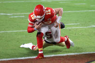 MIAMI, FLORIDA - FEBRUARY 02: Patrick Mahomes #15 of the Kansas City Chiefs runs for a touchdown against the San Francisco 49ers during the first quarter in Super Bowl LIV at Hard Rock Stadium on February 02, 2020 in Miami, Florida. (Photo by Al Bello/Getty Images)