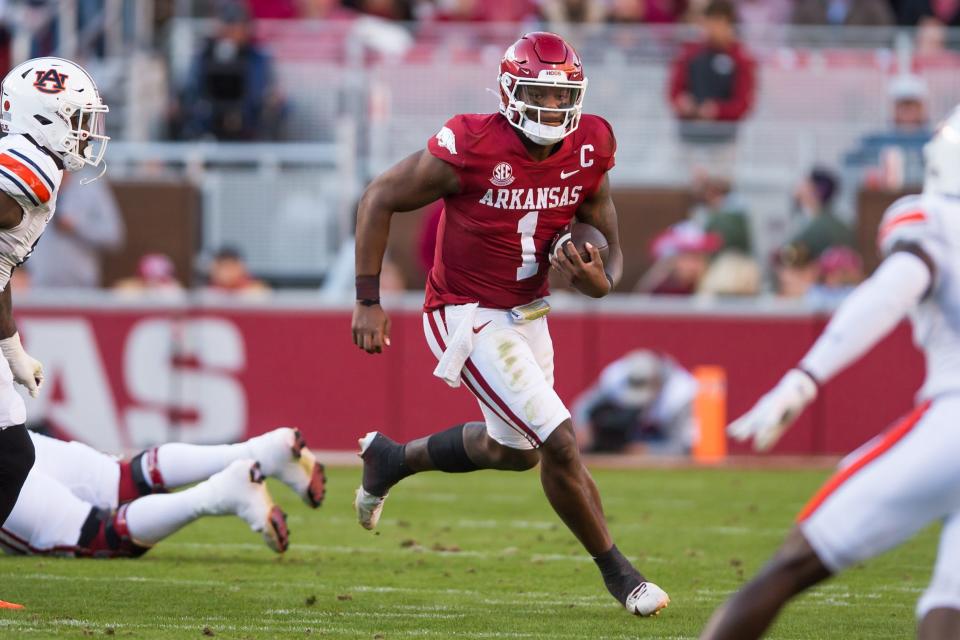 Arkansas Razorbacks quarterback KJ Jefferson (1) runs the ball during the second quarter in the game against the Auburn Tigers at Donald W. Reynolds Razorback Stadium on Nov. 11, 2023, in Fayetteville, Arkansas.