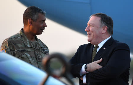 U.S. Secretary of State Mike Pompeo talks with U.S. General Vincent K. Brooks, commander of United States Forces Korea, upon his arrival at Osan Air Base in Pyeongtaek, South Korea October 7, 2018. Jung Yeon-je/Pool via REUTERS