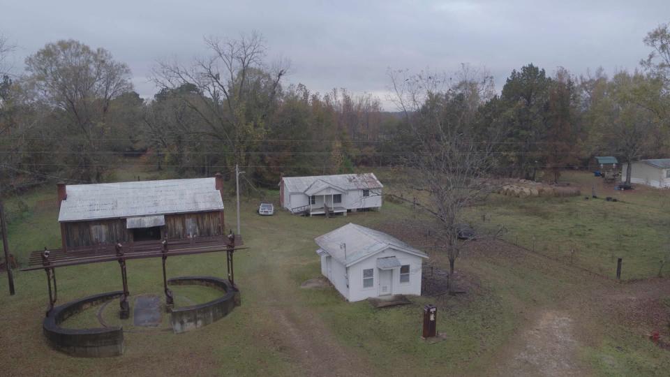 A photo of dwellings in Lowndes County, Alabama
