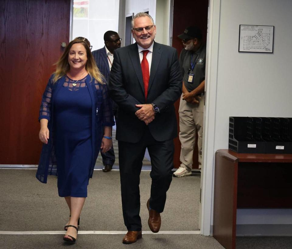 Broward School Board chair, Lori Alhadeff, District 4, left, walks into the press conference after the Broward School Board voted 7-2 Thursday, June 15, 2023, to name Peter Licata, right, as its new superintendent, the Kathleen C. Wright Building in Fort Lauderdale, Florida.