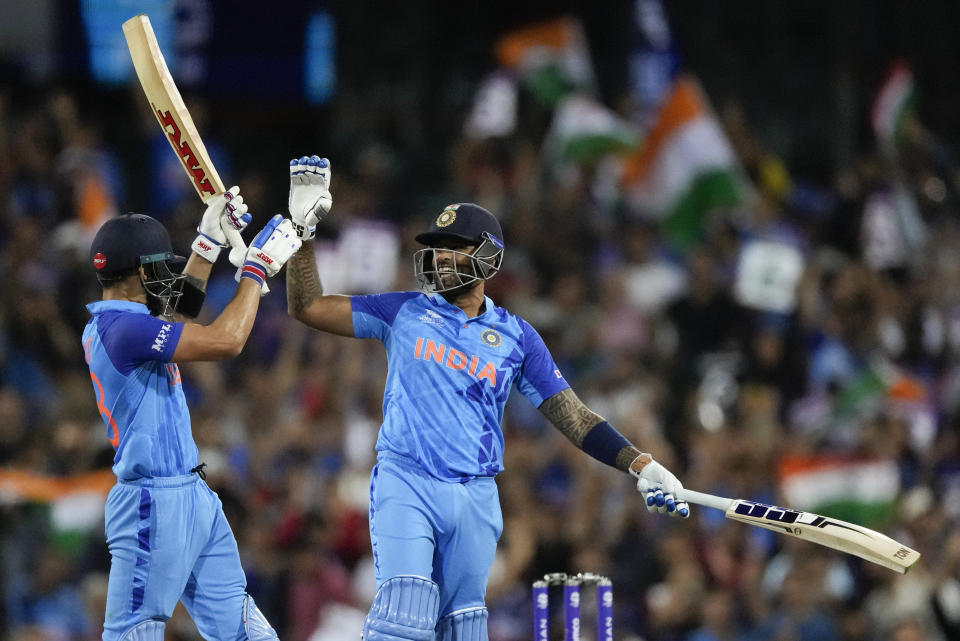 India's Virat Kohli, left, and teammate Suryakumar Yadav react at the end of their innings during the T20 World Cup cricket match between India and the Netherlands in Sydney, Australia, Thursday, Oct. 27, 2022. (AP Photo/Rick Rycroft)