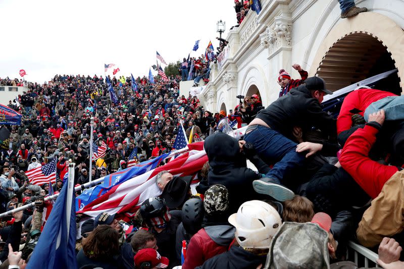 FILE PHOTO: Supporters of U.S. President Donald Trump storm the U.S. Capitol