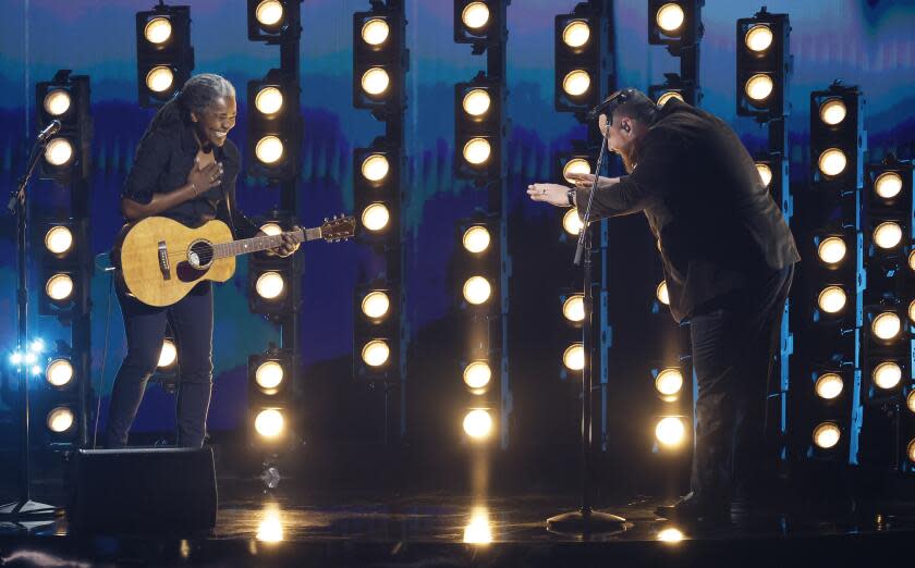 Los Angeles, CA - February 04: Tracy Chapman, left and Luke Combs, right, at the 66th Grammy Awards held at the Crypto.com Arena in Los Angeles, CA, Sunday, Feb. 4, 2024. (Robert Gauthier / Los Angeles Times)