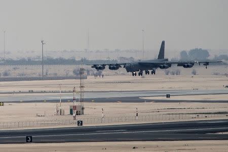 A U.S. Air Force B-52 Stratofortress from Barksdale Air Force Base, Louisiana, touches down at Al Udeid Air Base, Qatar, April 9, 2016. REUTERS/U.S. Air Force/Staff Sgt. Corey Hook/Handout via Reuters