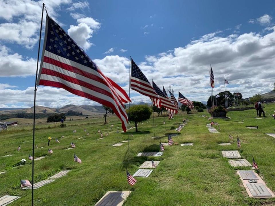 Flags fly at Los Osos Memorial Park and Mortuary Park during a Memorial Day ceremony in 2019.