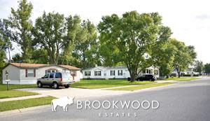 Residents at Brookwood Estates enjoy beautiful natural surroundings with plenty of greenery.