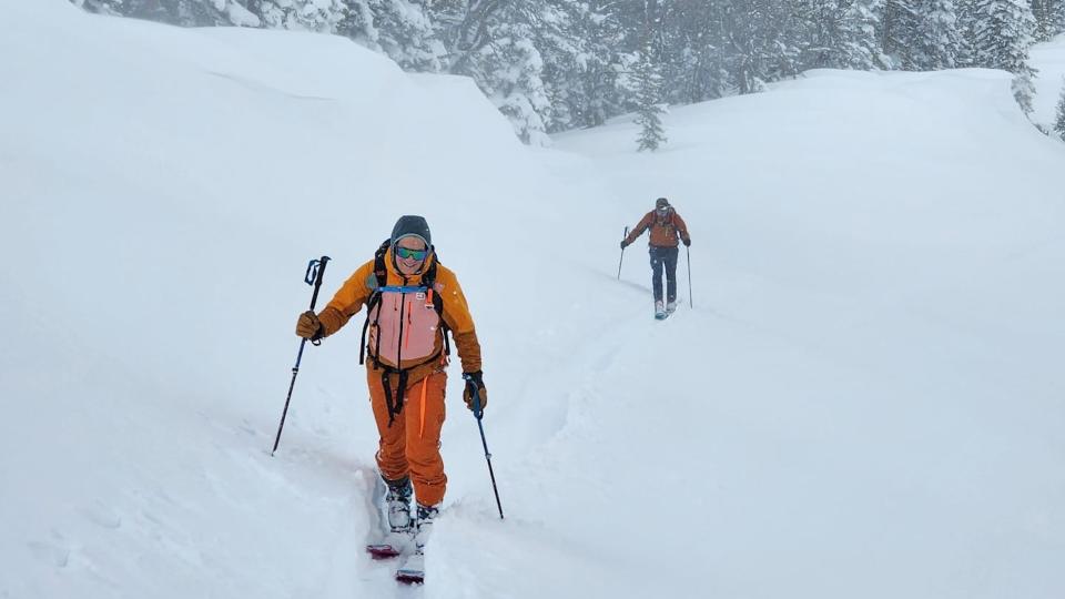 Woman wearing Ortovox Mesola ski jacket for skiing