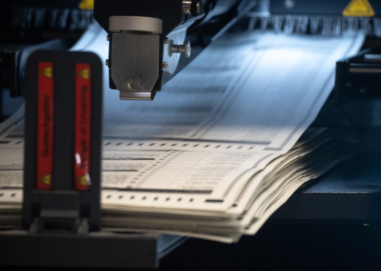 Ballots are processed on Nov. 10, 2022, at the Maricopa County Tabulation and Elections Center in Phoenix.