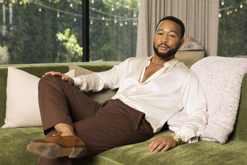 John Legend poses for a portrait on Monday, Aug. 15, 2022, in West Hollywood, Calif., to promote his latest double album "Legend." (Photo by Willy Sanjuan/Invision/AP)