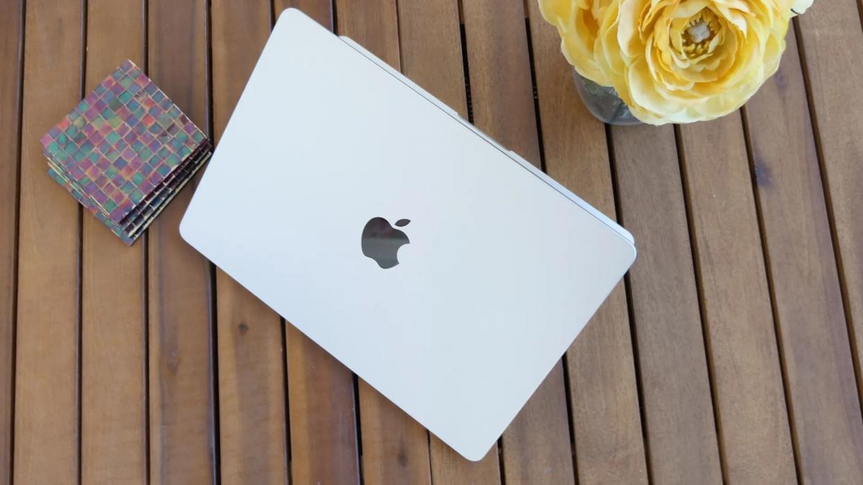  MacBook Air on a wooden table. 