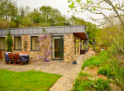 <p>This gorgeous sustainable Cornish home, located in the depths of Liskeard, is the perfect eco getaway. With space for up to eight guests, it features modern <a href="https://www.housebeautiful.com/uk/decorate/bedroom/a36107572/interior-design-mistakes-sleep/" rel="nofollow noopener" target="_blank" data-ylk="slk:interiors;elm:context_link;itc:0;sec:content-canvas" class="link ">interiors</a>, a large solar PV system, heat recovery system and its own water supply, too. There's also a welcoming hot tub, so don't forget your swimsuit. Dreamy. </p><p><a class="link " href="https://airbnb.pvxt.net/Ry5vg7" rel="nofollow noopener" target="_blank" data-ylk="slk:BOOK NOW;elm:context_link;itc:0;sec:content-canvas">BOOK NOW </a></p>