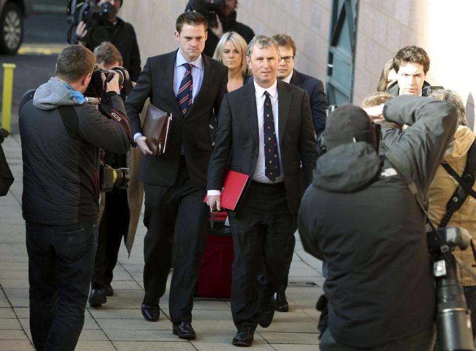 Former Deputy Speaker of Britain's House of Commons Nigel Evans, front centre, arrives at Preston Crown Court where he faces nine charges of alleged sexual offences against seven men, at court in Preston, England, Monday March 10, 2014. Evans denies all the alleged offences, which date from 2002 till 2013. (AP Photo / Peter Byrne, PA) UNITED KINGDOM OUT - NO SALES - NO ARCHIVES