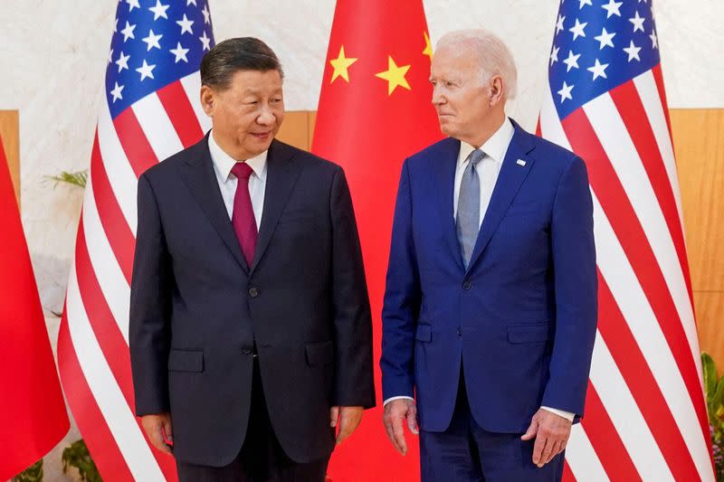 FILE PHOTO: FILE PHOTO: FILE PHOTO: Joe Biden meets with Xi Jinping on the sidelines of the G20 leaders' summit in Bali