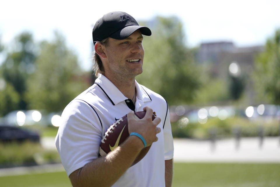 Minnesota NCAA college football punter Mark Crawford speaks to the media during an interview Monday, Aug. 29, 2022, in Minneapolis. From Rutgers standout Adam Korsak to Minnesota's Mark Crawford, half of the primary punters in the Big Ten this season are products of Prokick Australia. (AP Photo/Abbie Parr)