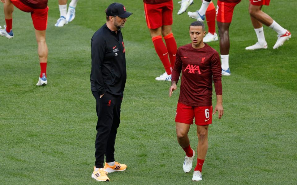 Liverpool manager Juergen Klopp with Thiago Alcantara during the warm up before the match - REUTERS/Gonzalo Fuentes