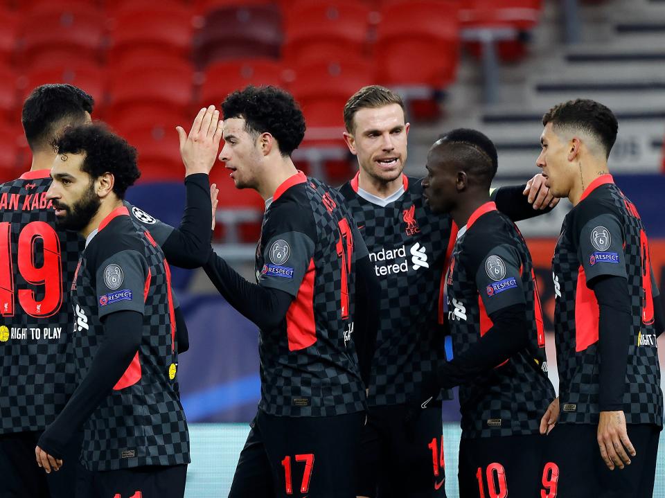 Liverpool captain Jordan Henderson (third right) led his team-mates in posting anti-Super League statementsGetty Images