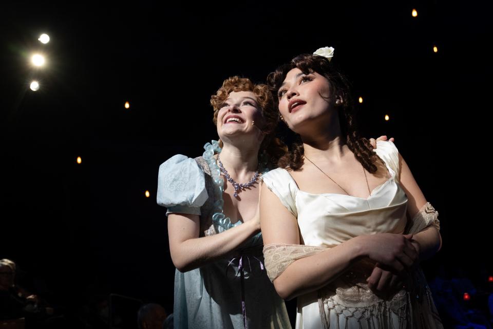 Daisy Wright as Sonya and Kelly Belarmino as Natasha shimmer and shine in the musical "Natasha, Pierre & the Great Comet of 1812" at Zach Theatre.
(Credit: Suzanne Cordeiro / Zach Theatre)