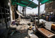 Damaged shops are seen at the site of car bomb attack near a government office in Karkh district in Baghdad, Iraq May 30, 2017. REUTERS/Khalid al-Mousily