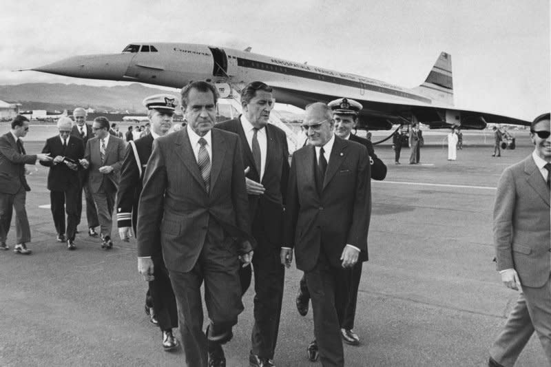 President Nixon leaves after taking a 5-minute tour on December 14, 1971, of the Concorde, the British-French supersonic jet. On November 22, 1977, the Concorde jetliner began scheduled flights to New York from London and Paris. File Photo by John Full/UPI