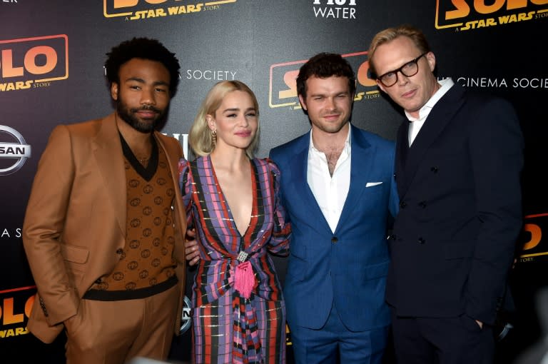 "Solo: A Star Wars Story" -- whose stars Donald Glover, Emilia Clarke, Alden Ehrenreich and Paul Bettany (L-R) are shown at the New York premiere in May 2018 -- underperformed at the box office, and Disney is slowing down its plans for the franchise