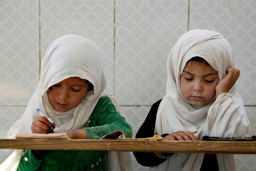 <em><sup>Afghan girls read the Quran in the Noor Mosque outside the city of Kabul, Afghanistan. Associated Press-Ebrahim Noroozi</sup></em>