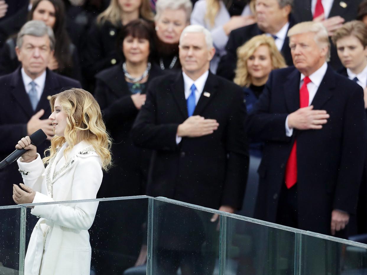 Jackie Evancho performs the National Anthem as Vice President Mike Pence and President Donald Trump watch (Getty)