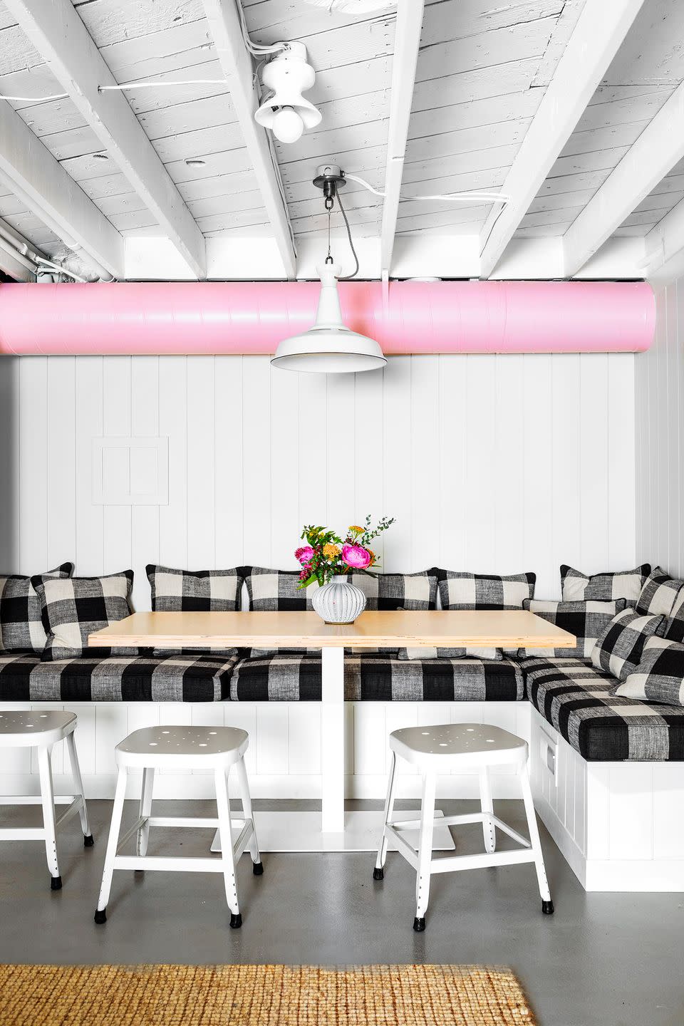 <p>Not technically the ceiling, but close it, painting an HVAC duct can truly transform an eyesore into style statement. "In this basement remodel, we would've had to spend a ton of money rerouting the HVAC air duct." designer Max Humphrey says. "Who wouldn't go with ballet slipper pink instead?" </p>