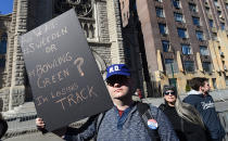 <p>Protesters march down Central Park West in New York City during a “Not My President’s Day” rally on Feb. 20, 2017, as part of a protest against President Trump. (Timothy A. Clary/AFP/Getty Images) </p>