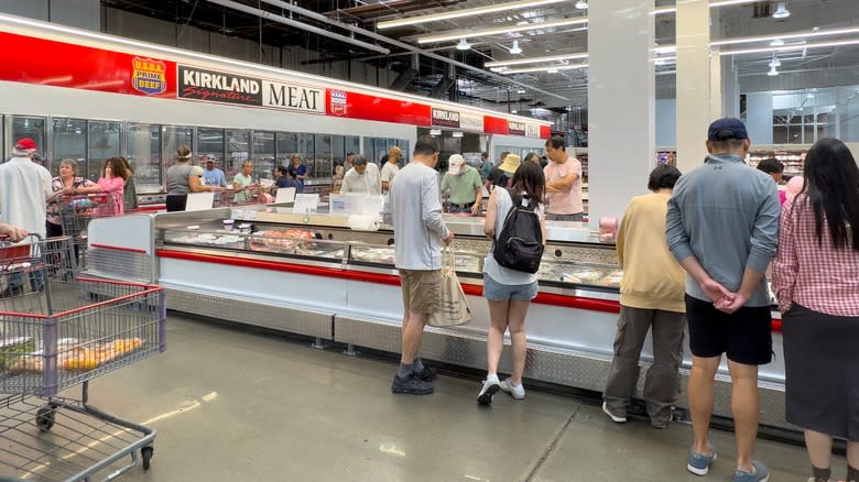 shopping at costco meat section building