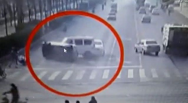 The moment the car rolls over onto its side after the impact of the incident. Source: Live Leak.