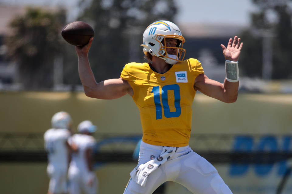 Justin Herbert will be in a boot for two weeks but is expected to be in the lineup for the regular season opener. (Photo by Jevone Moore/Icon Sportswire via Getty Images)