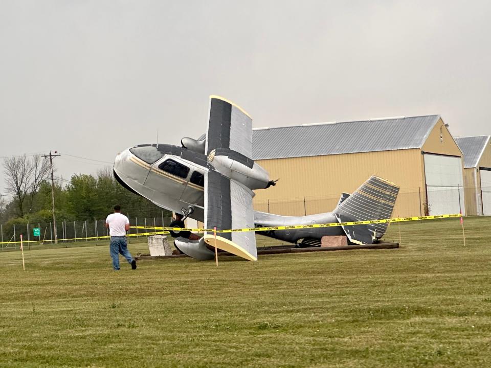 The airplane statue at the entrance to Manitowoc County Airport on Freedom Way off Menasha Avenue was blown off its base after a storm swept through the city at around 4:10 p.m. Thursday, Aug. 3, 2023.