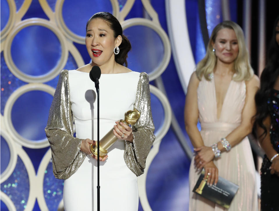 This image released by NBC shows Sandra Oh accepting the award for best actress in a drama series for her role in "Killing Eve" during the 76th Annual Golden Globe Awards at the Beverly Hilton Hotel on Sunday, Jan. 6, 2019 in Beverly Hills, Calif. (Paul Drinkwater/NBC via AP)