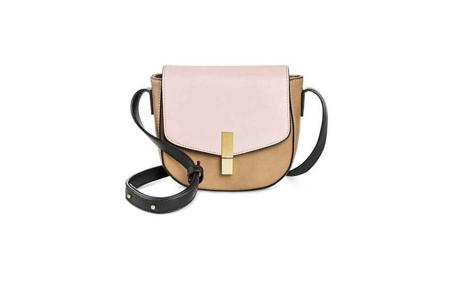 <p>This two-toned bag with gold hardware is the perfect pop of color to pair with a black dress or shirt.</p><p>To buy: <a rel="nofollow noopener" href="http://click.linksynergy.com/fs-bin/click?id=93xLBvPhAeE&subid=0&offerid=438862.1&type=10&tmpid=19903&RD_PARM1=http%3A%2F%2Fwww.target.com%2Fp%2Ffaux-leather-brenda-crossbody-handbag%2F-%2FA-51127303&u1=tl_crossbodybags" target="_blank" data-ylk="slk:target.com;elm:context_link;itc:0;sec:content-canvas" class="link ">target.com</a>, $30.</p>