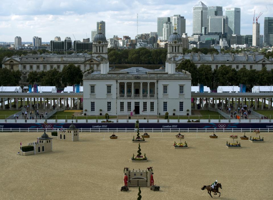 Australia's Lucinda Fredericks riding Flying Finish rides through the stadium in the cross country phase of the eventing competition of the 2012 London Olympic Games at the Equestrian venue in Greenwich Park, London on July 30, 2012.  AFP PHOTO / ADRIAN DENNIS        (Photo credit should read ADRIAN DENNIS/AFP/GettyImages)