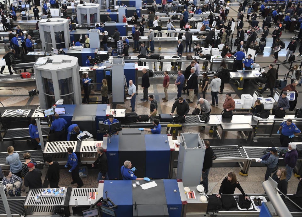 DENVER CO – JANUARY 14: TSA agents at Denver International Airport continue to work without pay after 24 days of the partial government shutdown on January 14, 2019 in Denver, Colorado. (Photo credit: RJ Sangosti/The Denver Post via Getty Images)