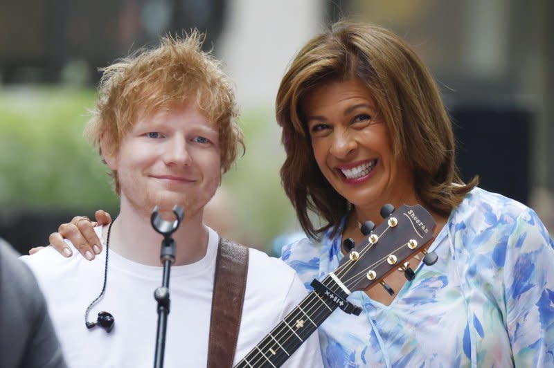 Hoda Kotb (R) and Ed Sheeran appear on "Today" in June. File Photo by John Angelillo/UPI
