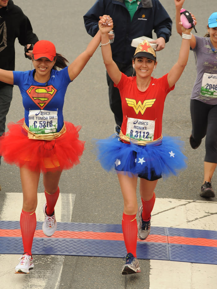 Monika Allen (right), running with her friend Tara Baize in 2013, has died of brain cancer. (Photo: Glamrunner.com)