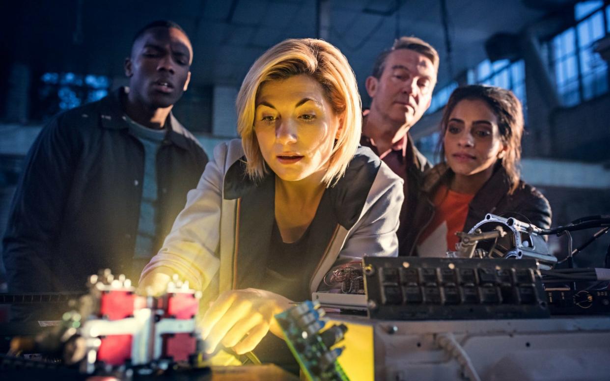Jodie Whittaker as the new Doctor, accompanied (l-r) by Ryan (Tosin Cole), Graham (Bradley Walsh) and Taz (Mandip Gill) - PA