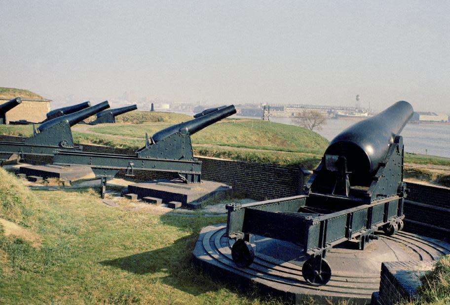 FILE - This Dec. 22, 2011 file photo shows Fort McHenry in Baltimore, Md., where Francis Scott Key wrote "The Star-Spangled Banner," and shot of the cannon which defended the city against the British. All the baseball teams are based in major U.S. cities and many of the stadiums are situated in bustling downtown areas with engrossing things to do and savory places to eat when you aren't attending a game. These attractions should help the cause of baseball fans trying to recruit a spouse or other traveling teammates who may not appreciate the sublime pleasures of the game.(AP Photo, file)