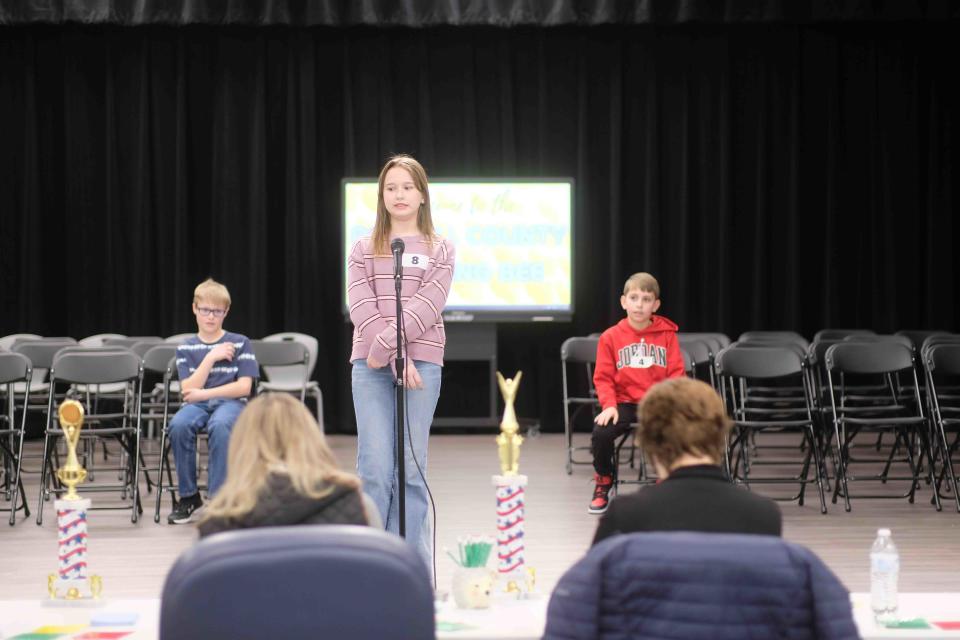 Lily McClenny attempts spell a word Monday at the Randall County Junior Spelling Bee at Heritage Hills Elementary in Amarillo.