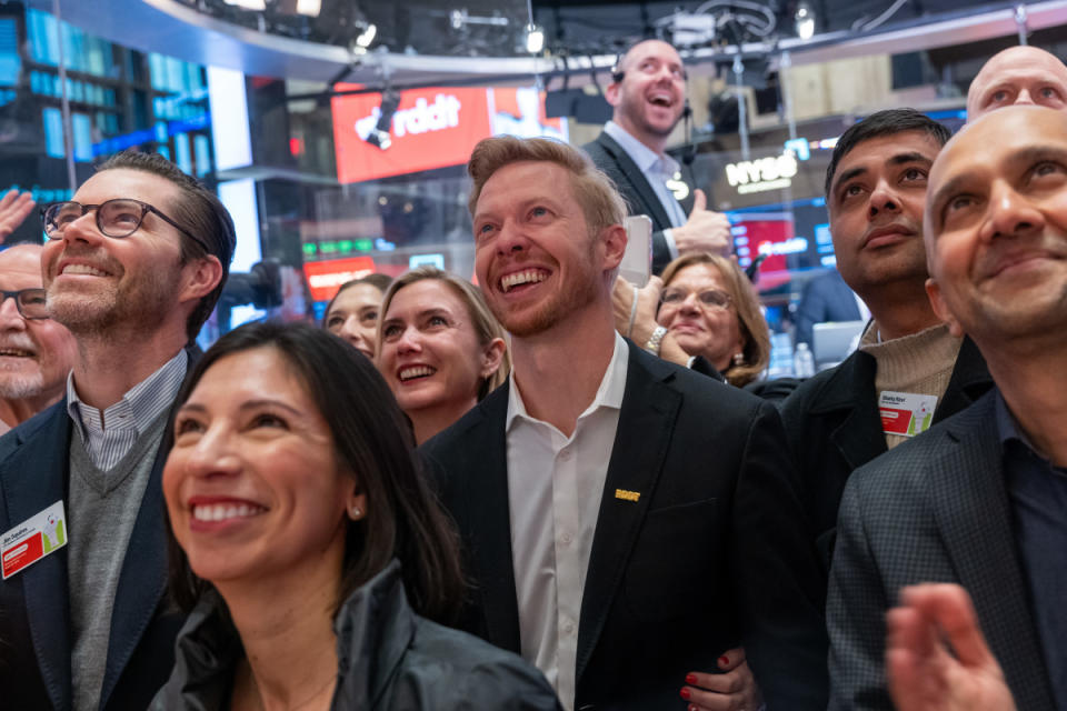 Reddit CEO Steve Huffman stands on the floor of the New York Stock Exchange with employees (NYSE) as it prepares for Reddit's initial public offering (IPO) on March 21 in New York City. <p>Spencer Platt/Getty Images</p>