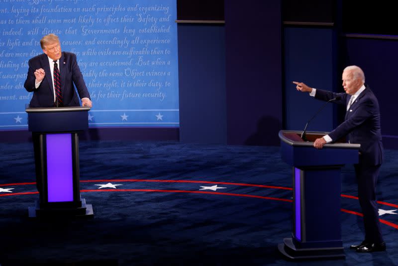 U.S. President Donald Trump and Democratic presidential nominee Joe Biden participate in their first 2020 presidential campaign debate in Cleveland